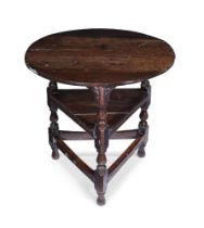 AN OAK CRICKET TABLE, CIRCA 1700 AND LATER