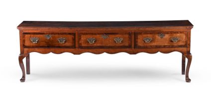 A GEORGE III OAK AND WALNUT CROSS BANDED DRESSER BASE, CIRCA 1760