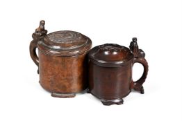 TWO NORWEIGIAN CARVED PEG TANKARDS, 18TH OR 19TH CENTURY