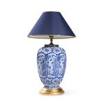 A DUTCH DELFT BLUE AND WHITE CHINOISERIE OCTAGONAL SECTION OVOID VASE LATER ADAPTED AS A LAMP