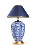 A DUTCH DELFT BLUE AND WHITE CHINOISERIE OCTAGONAL SECTION OVOID VASE LATER ADAPTED AS A LAMP