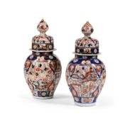 A PAIR OF JAPANESE IMARI BALUSTER VASES AND COVERS, MEIJI OR TAISHO PERIOD