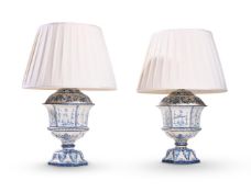 A PAIR OF PAINTED TOLEWARE HEXAGONAL TABLE LAMPS, 20TH CENTURY, IN THE MANNER OF DELFT POTTERY