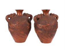 A LARGE PAIR OF JAPANESE TOKONAME RED CLAY DRAGON VASES