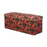 A LATE VICTORIAN UPHOLSTERED OTTOMAN
