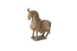 A TERRACOTTA HORSE IN TANG STYLE