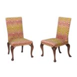 A PAIR OF WALNUT AND UPHOLSTERED SIDE CHAIRS IN GEORGE II STYLE