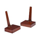 A PAIR OF MAHOGANY PLATE STANDS IN REGENCY STYLE