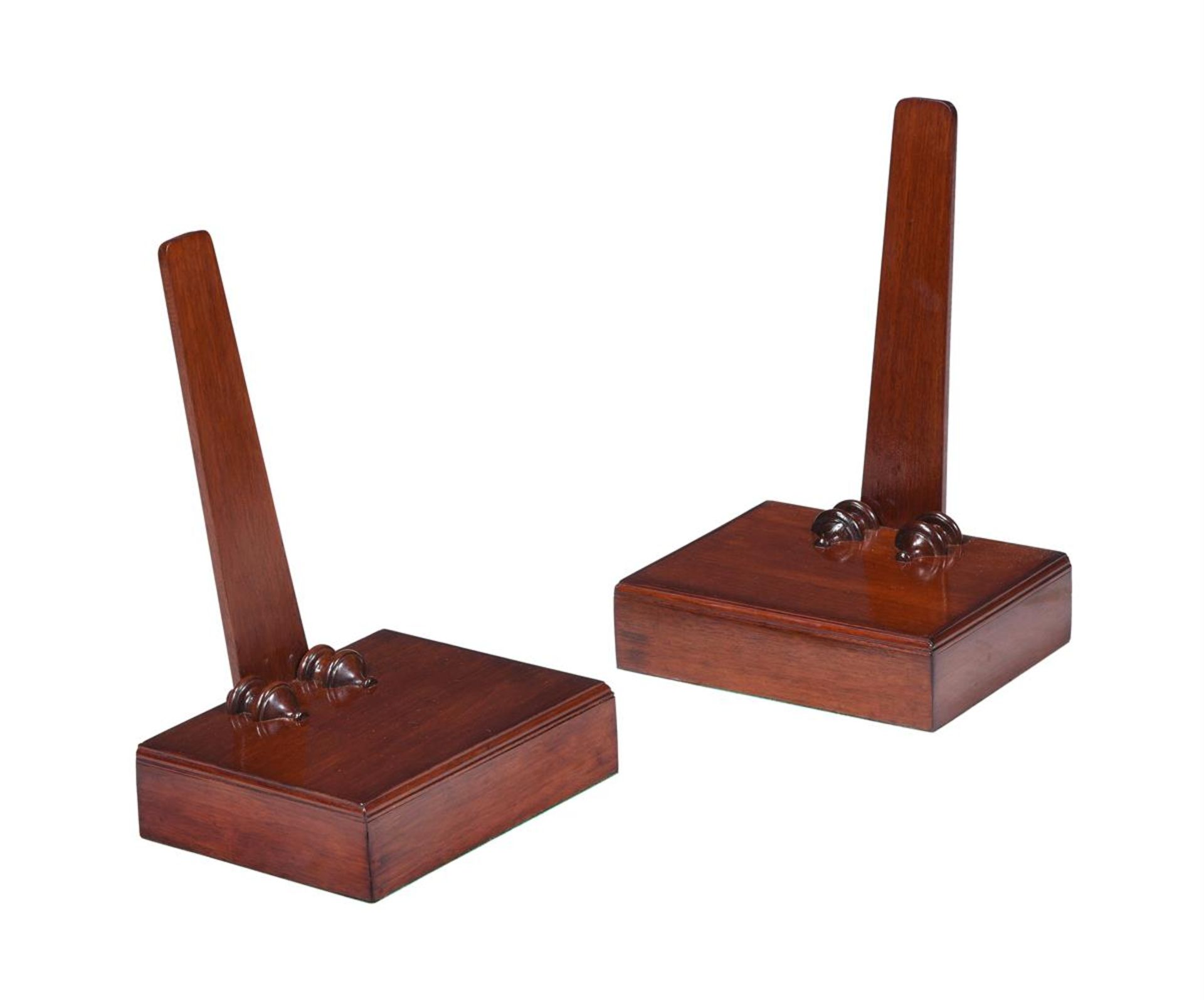 A PAIR OF MAHOGANY PLATE STANDS IN REGENCY STYLE