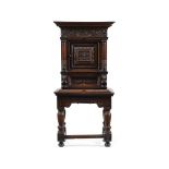 Y A DUTCH OAK AND EBONY CABINET ON STAND OR 'KAST'
