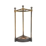 A BRASS AND IRON CORNER STICK STAND