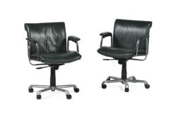 A PAIR OF GREEN LEATHER UPHOLSTERED OFFICE CHAIRS