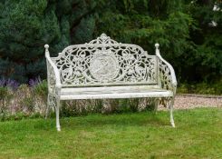 A CAST IRON GARDEN BENCH, AFTER THE COALBROOKDALE MEDALLION DESIGN