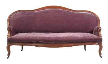 A VICTORIAN MAHOGANY AND UPHOLSTERED SOFA