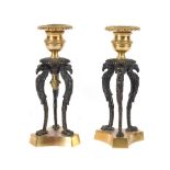 A PAIR OF EMPIRE STYLE ORMOLU SHORT CANDLESTICKS