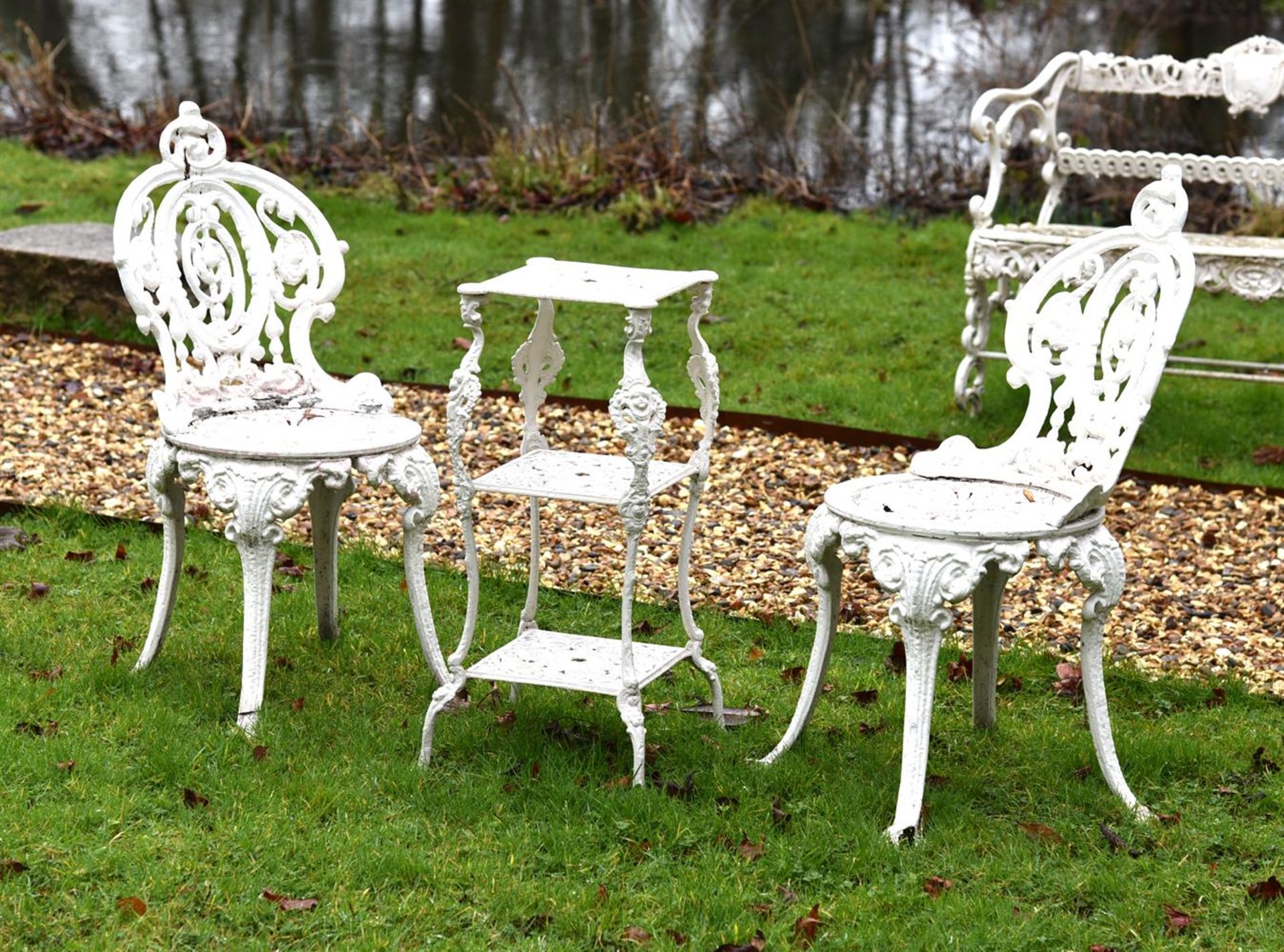 A GROUP OF VARIOUS WHITE PAINTED METAL GARDEN FURNITURE
