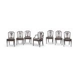 A SET OF SEVEN MAHOGANY DINING CHAIRS IN GEORGE III STYLE
