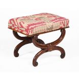 A WALNUT, BEECH AND IKAT UPHOLSTERED X-FRAME STOOL, IN THE MANNER OF GILLOWS