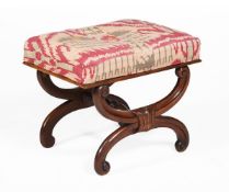 A WALNUT, BEECH AND IKAT UPHOLSTERED X-FRAME STOOL, IN THE MANNER OF GILLOWS
