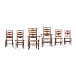 A HARLEQUIN SET OF SIX ASH LADDER BACK DINING CHAIRS