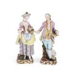 A PAIR OF MEISSEN (OUTSIDE DECORATED) FIGURES OF A GALLANT AND COMPANION