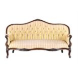 A VICTORIAN MAHOGANY AND UPHOLSTERED SOFA IN FRENCH TASTE