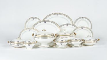 A STAFFORDSHIRE PORCELAIN ARMORIAL PART DINNER SERVICE