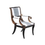 AN EBONISED, PAINTED AND PARCEL GILT ARMCHAIR, IN REGENCY STYLE