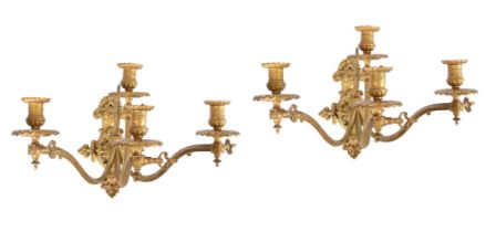 A PAIR OF GILT METAL WALL LIGHTS