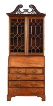 A GEORGE III MAHOGANY BUREAU BOOKCASE