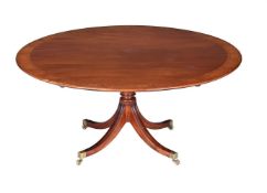 A MAHOGANY AND CROSSBANDED CENTRE DINING TABLE