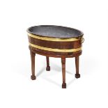 A GEORGE III MAHOGANY AND BRASS BOUND WINE COOLER ON STAND, CIRCA 1790