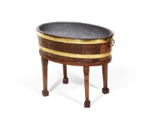 A GEORGE III MAHOGANY AND BRASS BOUND WINE COOLER ON STAND, CIRCA 1790