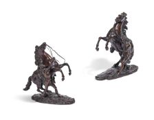 AFTER COUSTOU, A PAIR OF BRONZE MARLY HORSES LATE 19TH OR EARLY 20TH CENTURY