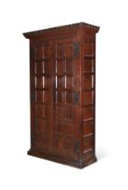 AN OAK HALL CUPBOARD, PROBABLY COTSWOLD SCHOOL, LATE 19TH OR EARLY 20TH CENTURY