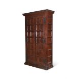 AN OAK HALL CUPBOARD, PROBABLY COTSWOLD SCHOOL, LATE 19TH OR EARLY 20TH CENTURY