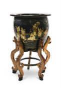 A CHINESE BLACK LACQUERED AND GILT DECORATED PLANTER ON GILTWOOD STAND