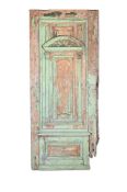 A LARGE PAINTED PINE COURTYARD DOOR AND OVER-DOOR, 19TH CENTURY