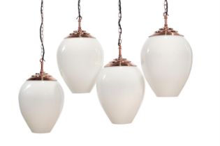 A SET OF FOUR 'EIRLYS' PATINATED COPPER AND OPALINE GLASS PENDANT LIGHTS, BY DREW PRITCHARD LTD