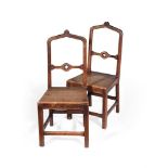 A PAIR OF CARVED OAK GOTHIC HALL CHAIRS, IN THE MANNER OF AUGUSTUS PUGIN, SECOND HALF 19TH CENTURY