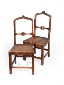A PAIR OF CARVED OAK GOTHIC HALL CHAIRS, IN THE MANNER OF AUGUSTUS PUGIN, SECOND HALF 19TH CENTURY
