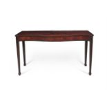 A GEORGE III MAHOGANY SERPENTINE FRONTED CONSOLE TABLE IN THE MANNER OF THOMAS CHIPPENDALE