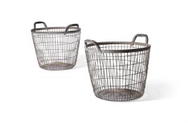 A PAIR OF GALVANISED METAL TWIN HANDLED BASKETS, 20TH CENTURY