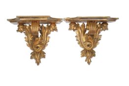 A PAIR OF REGENCY CARVED GILTWOOD WALL BRACKETS IN THE MANNER OF GILLOWS