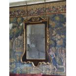 A LARGE GEORGE II WALNUT AND CARVED GILTWOOD MIRROR, CIRCA 1730