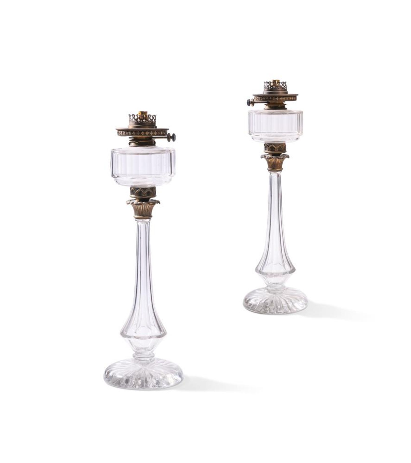 A PAIR OF VICTORIAN MOULDED GLASS AND GILT METAL OIL LAMPS, SECOND HALF 19TH CENTURY