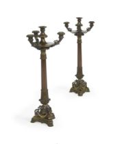 A PAIR OF LOUIS PHILIPPE BRONZE FOUR BRANCH CANDELABRA, CIRCA 1835