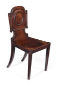 A GEORGE III MAHOGANY HALL CHAIR IN THE MANNER OF MARSH & TATHAM, CIRCA 1800