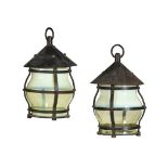 A PAIR OF ARTS AND CRAFTS BLACK PAINTED METAL AND VASELINE GLASS LANTERNS