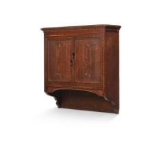 Y AN ARTS & CRAFTS OAK, YEW AND EBONY STRUNG HANGING CABINET, LATE 19TH OR EARLY 20TH CENTURY